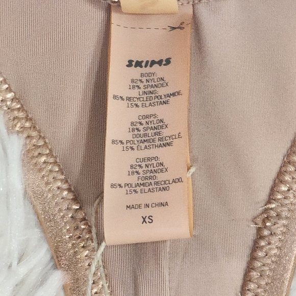 SKIMS METALLIC SWIM CYCLE SUIT/NWT / Champagne color - Picture 9 of 14